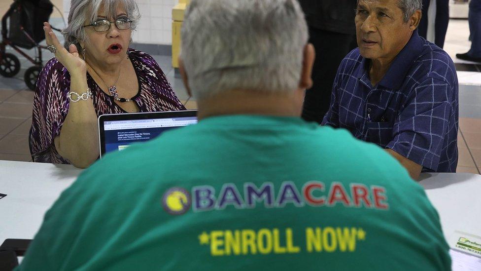 People sign up for health insurance in Miami, Florida. 1 November 2017