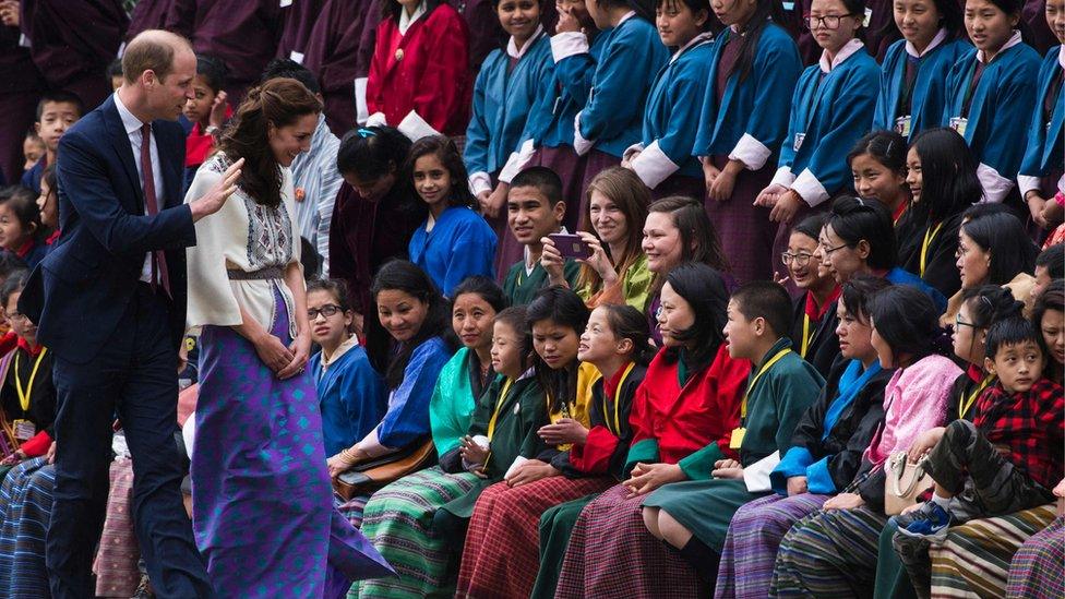 Duke and Duchess of Cambridge greeting crowds in Bhutan