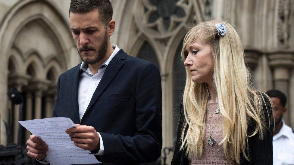 Charlie's parents outside the High Court