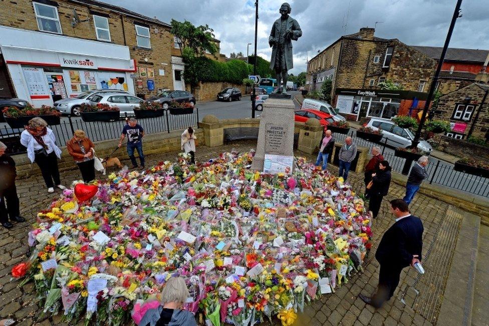 Floral tributes at Joseph Priestley memorial in Birstall