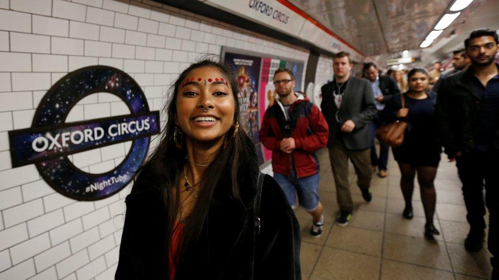 Passengers at the Night Tube at Oxford Circus station