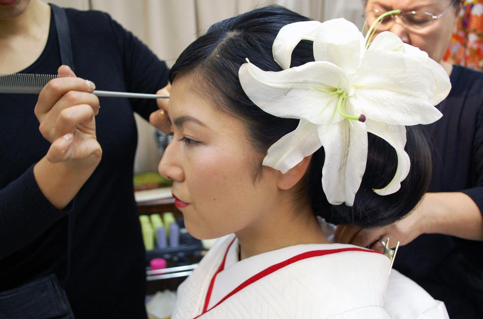 Bride being made up