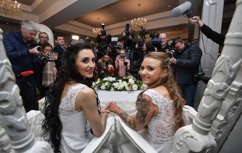 Sharni Edwards (l) and Robyn Peoples, face the media after they became Northern Ireland's first legally married same sex couple on 11 February 2020 in Carrickfergus.