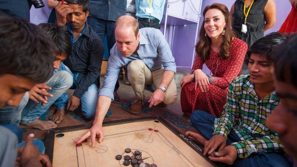 The Duke and Duchess of Cambridge with street children