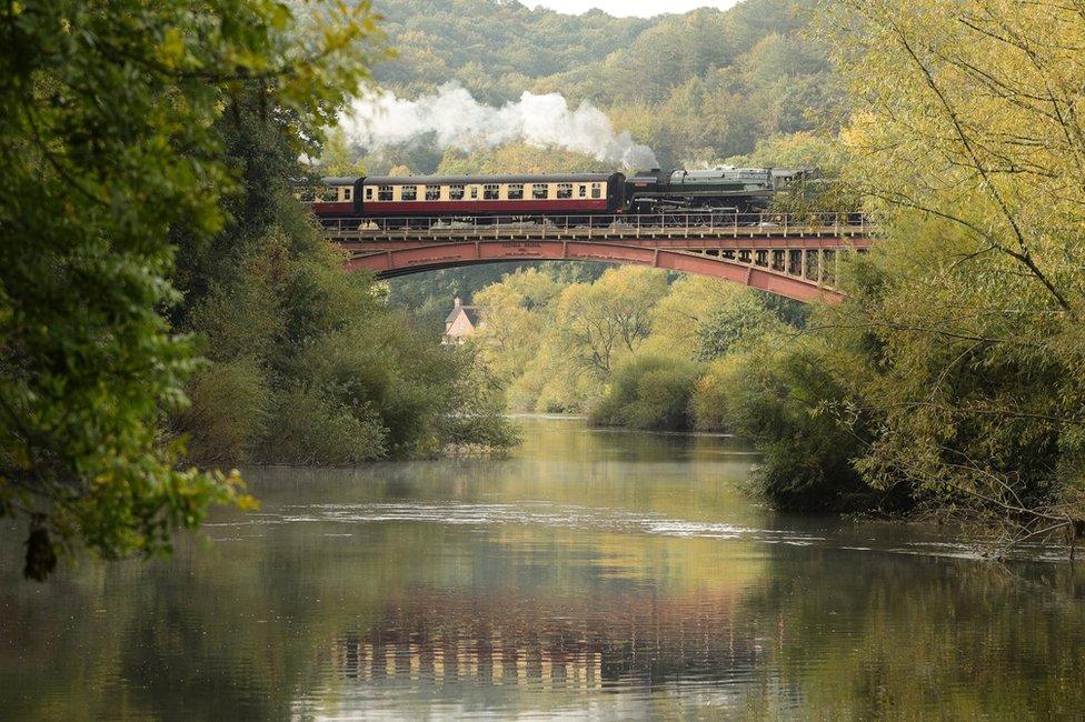 A steam train travelling over the Victoria Bridge between Bewdley and Arley on the Severn Valley Railway in Worcestershire