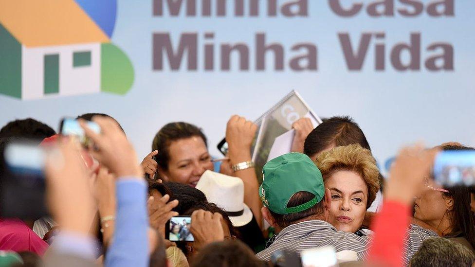 Dilma Rousseff (C-R) attends the launching ceremony of a new stage of the state-subsidized housing programme, May 6, 2016