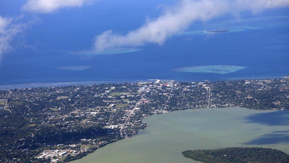 An aerial view of the Tongan capital Nuku'alofa and the sea