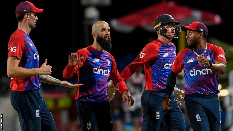 England players celebrating a wicket