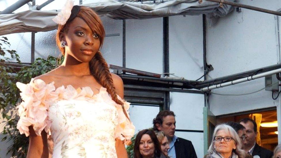 This undated handout photograph taken by family members shows Naomi Musenga posing during a fashion show