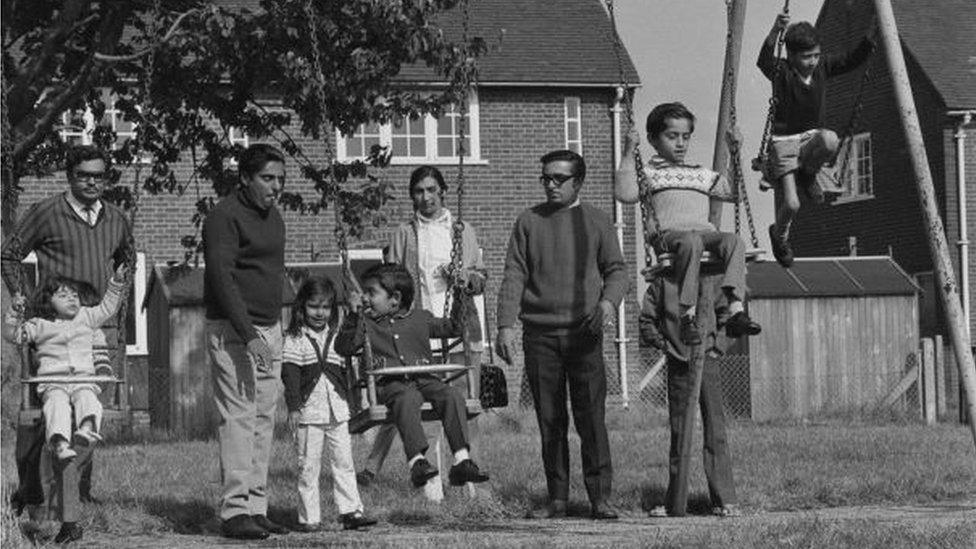 Family playing in park near Stradishall camp