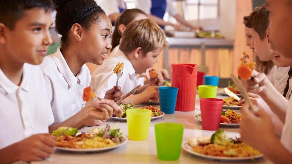 School children eating