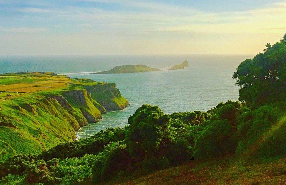 A sun set over the bay in Rhossili