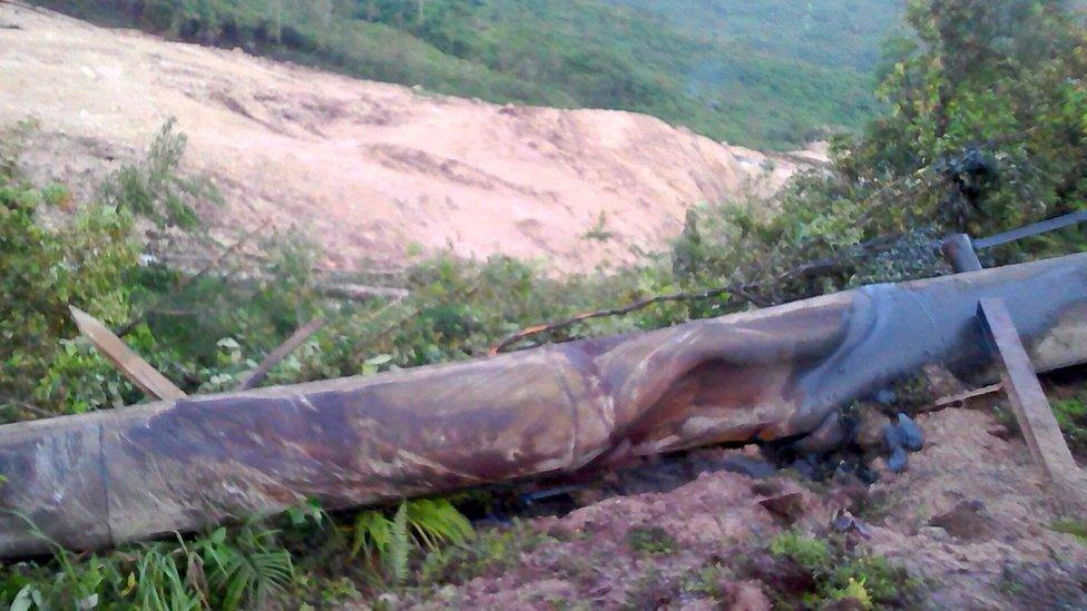 A supplied image shows a landslide and damage to a road located near the township of Tabubil after an earthquake that struck Papua New Guinea's Southern Highlands