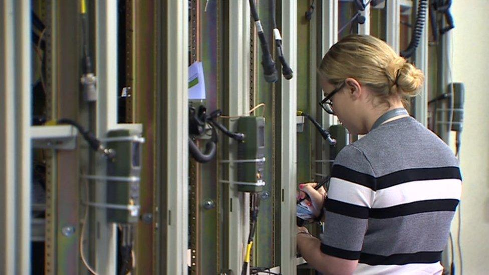 A woman working at General Dynamics