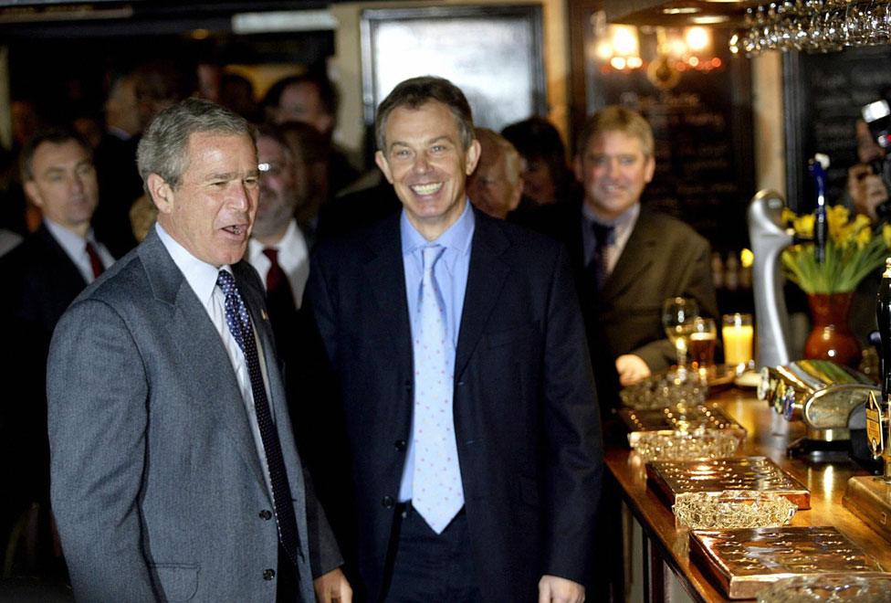 George W Bush and Minister Tony Blair stop by the Dun Cow Inn for lunch in 2003