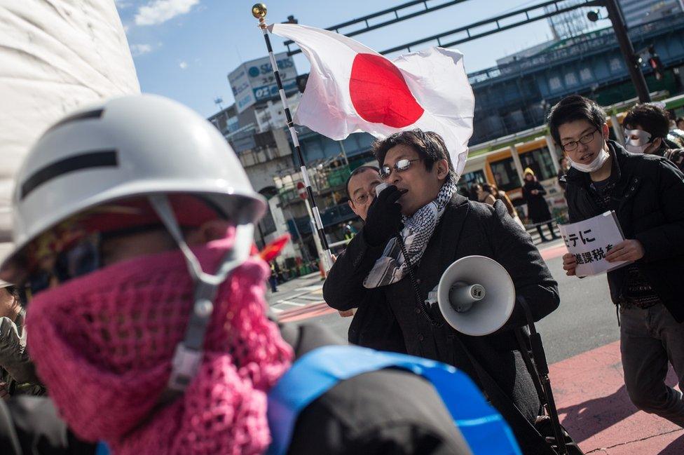 Japanese men protest against Valentine's Day on 14 February, 2015 in Tokyo, Japan.