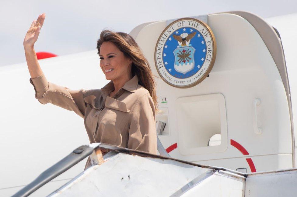 Melania Trump waves as she lands in Malawi