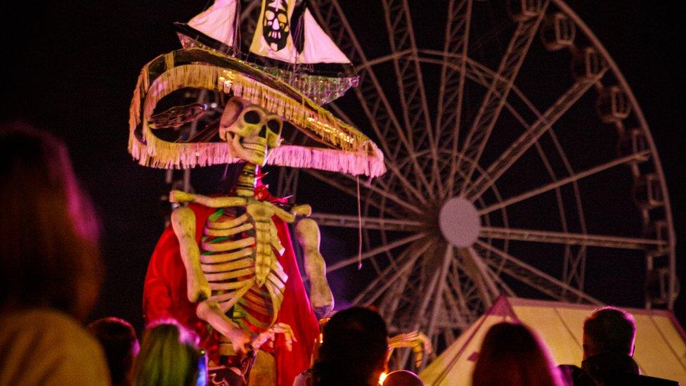 A Ferris wheel and skeleton at the Fire on the Water festival in Great Yarmouth