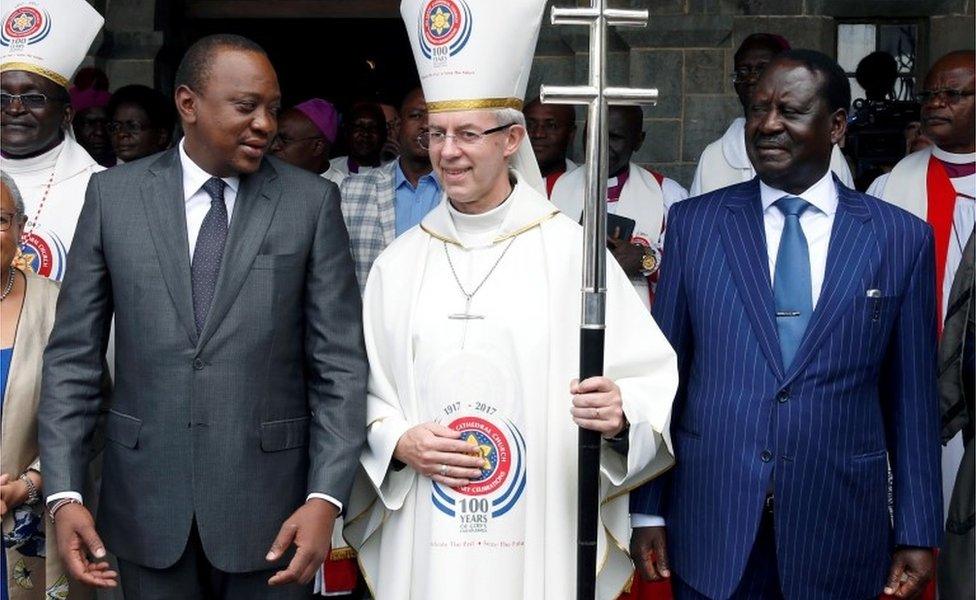 President Uhuru Kenyatta (L), Archbishop of Canterbury Justin Welby (C), and Kenyan opposition leader of the National Super Alliance (NASA) coalition Raila Odinga (R) pose for a photograph after a ceremony at the All Saints Anglican Church in Nairobi, Kenya November 5, 2017.