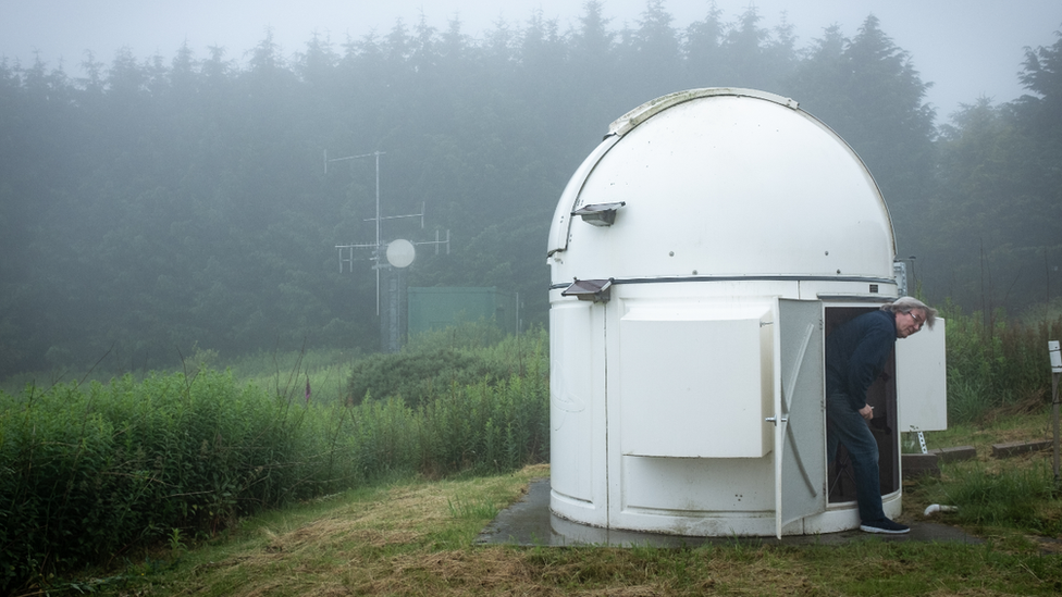 Jay Tate exiting on of the smaller telescopes at the centre