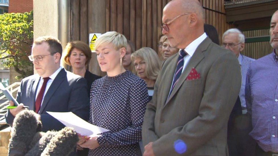 Family outside the coroner's court