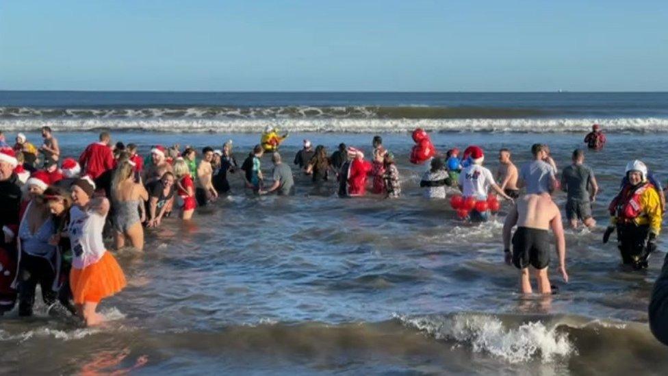 Dippers in the sea at Seaton Carew, Hartlepool