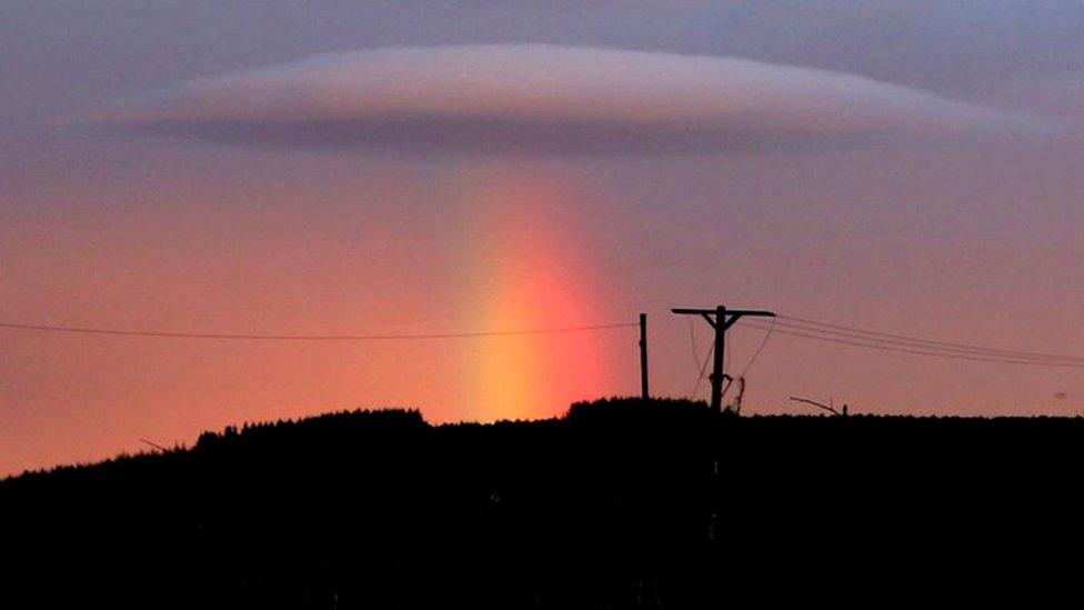 Cloud and rainbow