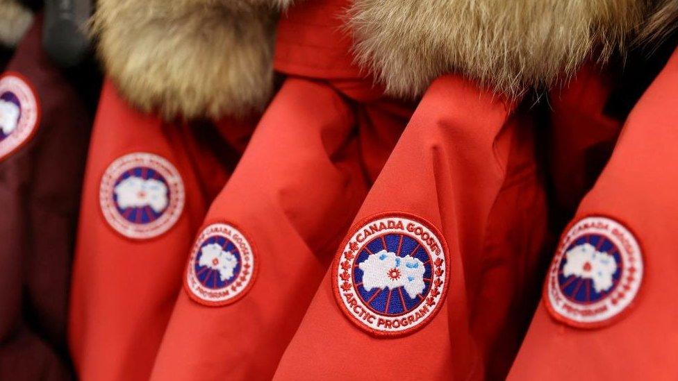 Photo of Canada Goose logo on red coats