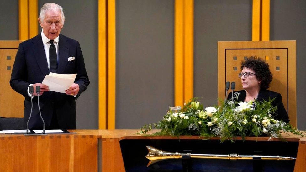 King Charles speaking in the Senedd as the Llywydd Elin Jones looks on