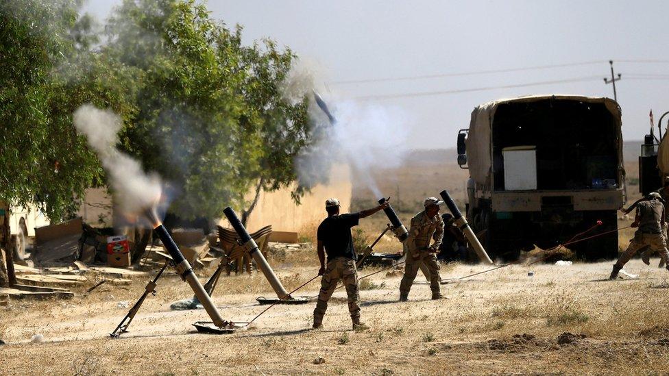 Iraqi soldiers battle Islamic State militants in Ayadiya, north-west of Tal Afar, Iraq (28 August 2017)