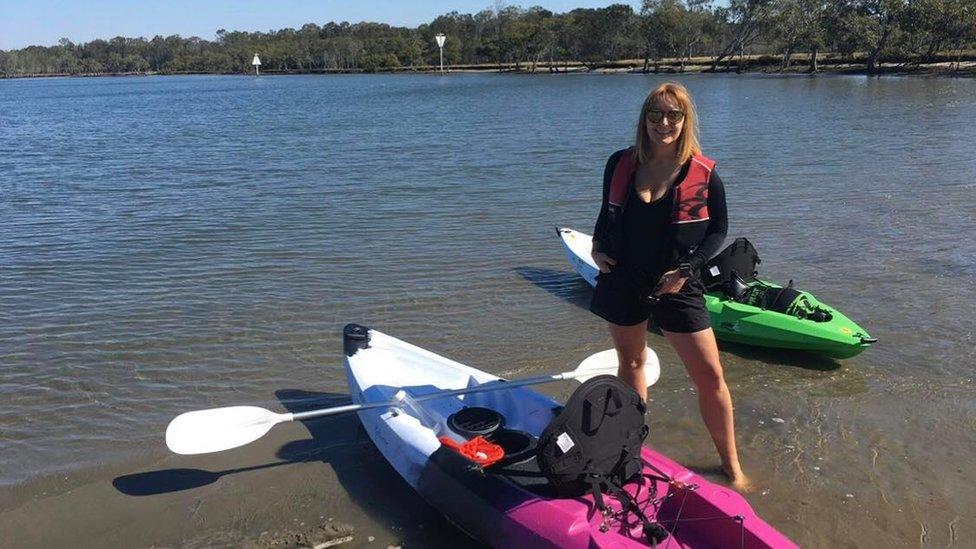 Ann Boswell with a canoe