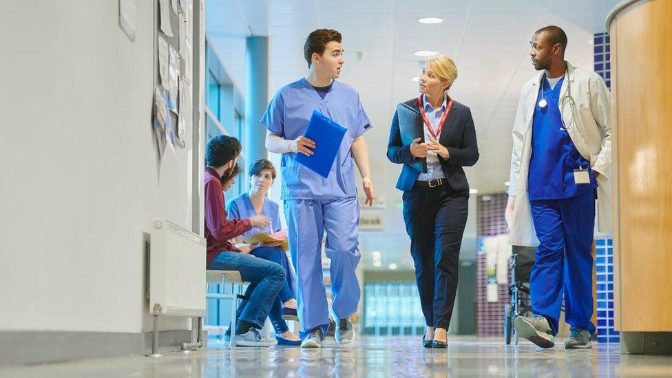 Doctors in hospital corridor