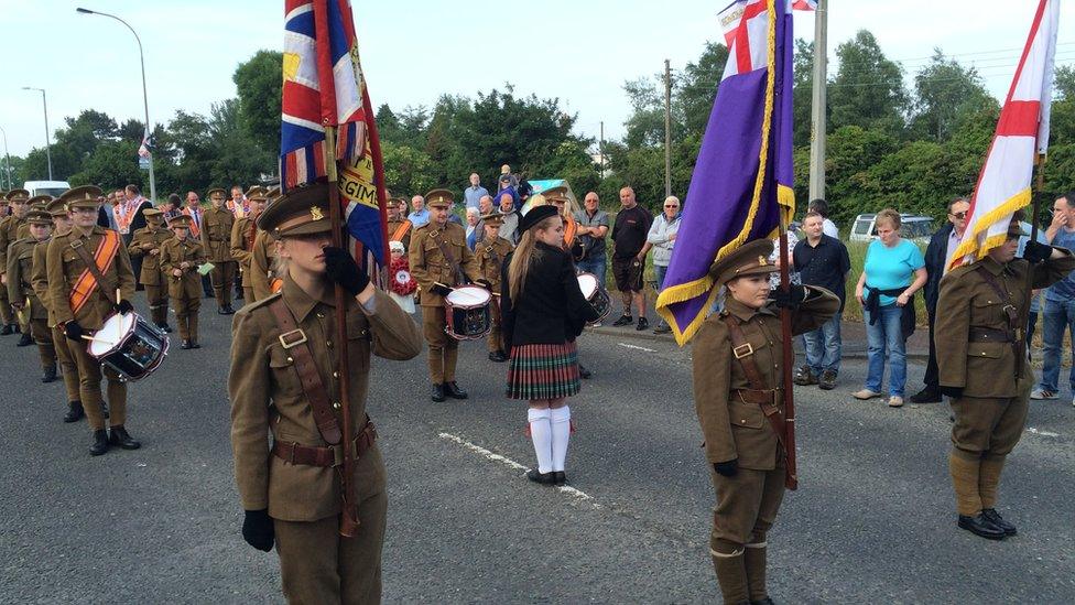 Orange bands in traditional World War One style military uniforms