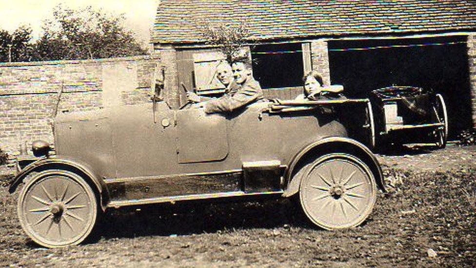 Joyce pictured with her father driving at the family home in 1926