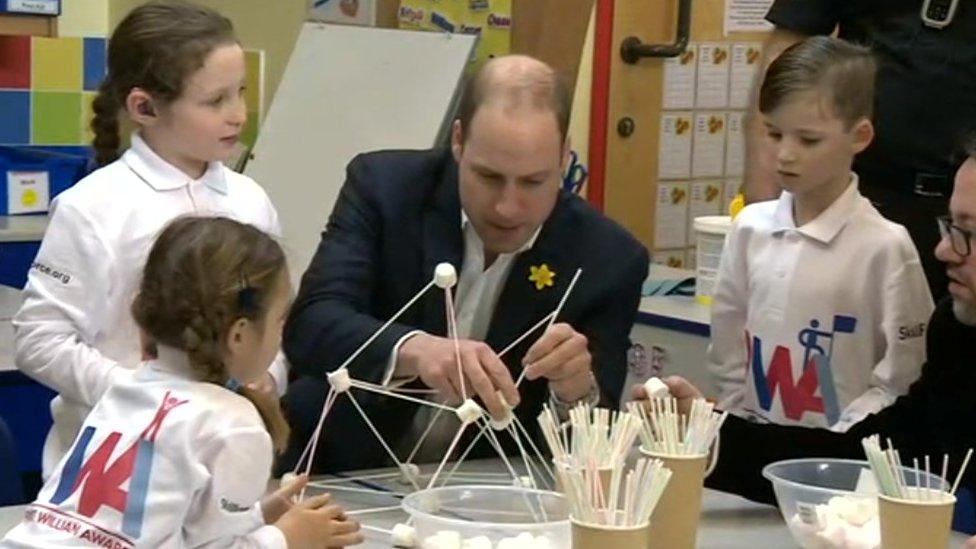 Prince William makes a free-standing marshmallow tower with pupils from Bishopstone Primary School in Swindon