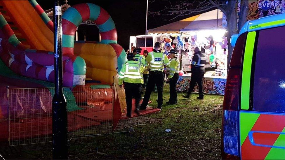 Police at the scene of the inflatable slide collapse