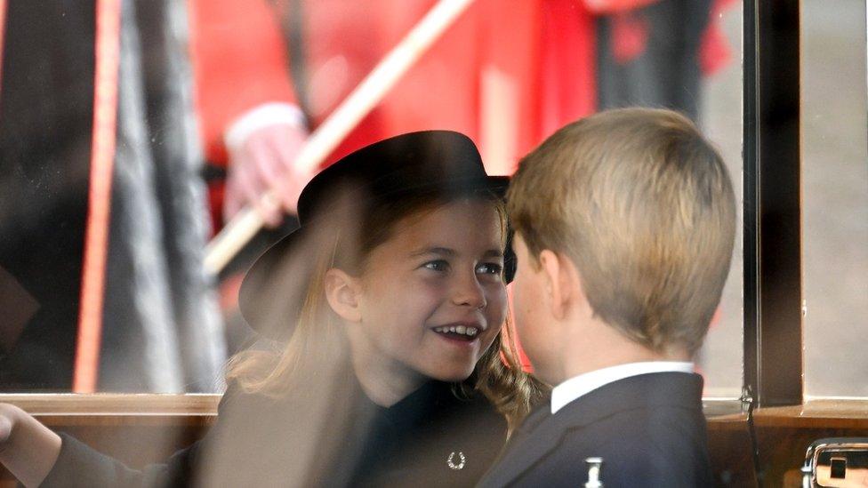 Prince George of Wales and Princess Charlotte of Wales during the State Funeral of Queen Elizabeth II at Westminster Abbey on September 19, 2022 in London, England.