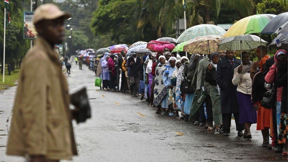 Crowd in the rain