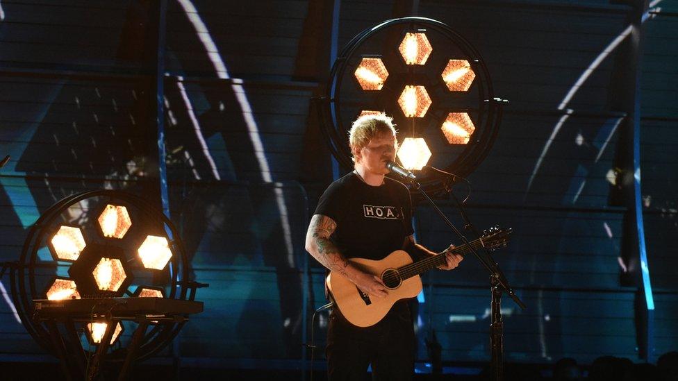 Ed Sheeran performs onstage during the 59th Annual Grammy music Awards