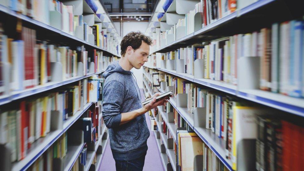 Student in library