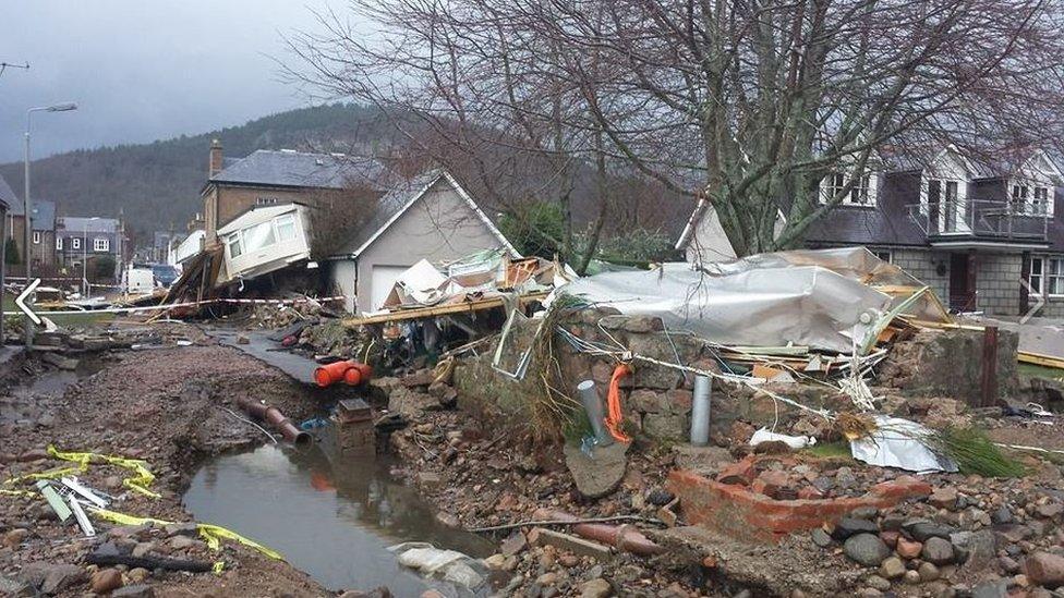 Debris from damaged houses and trailers