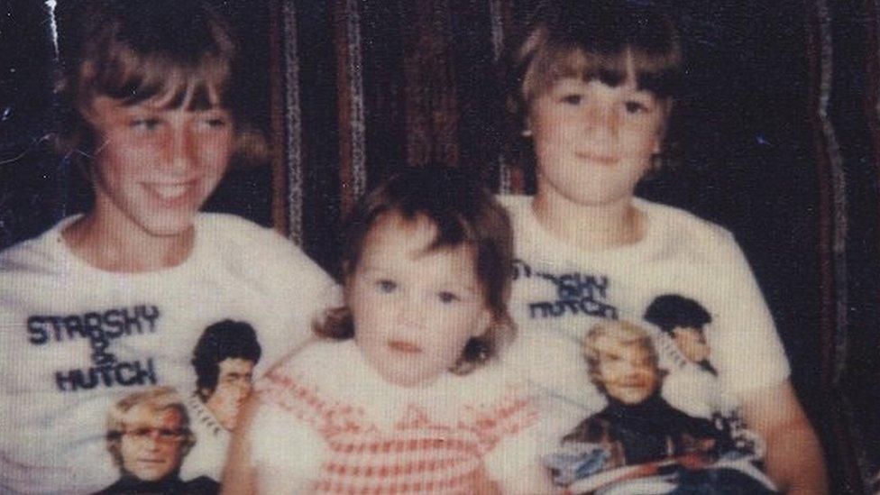 John Greenwood (aged 11) with sister Deborah (aged two) and brother David (aged eight)