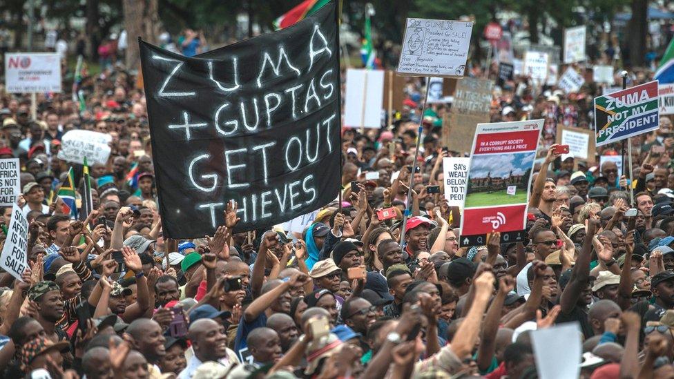 Tens of thousands of South Africans from various political and civil society groups march to the Union Buildings to protest against South African president and demand his resignation on April 7, 2017 in Pretoria.