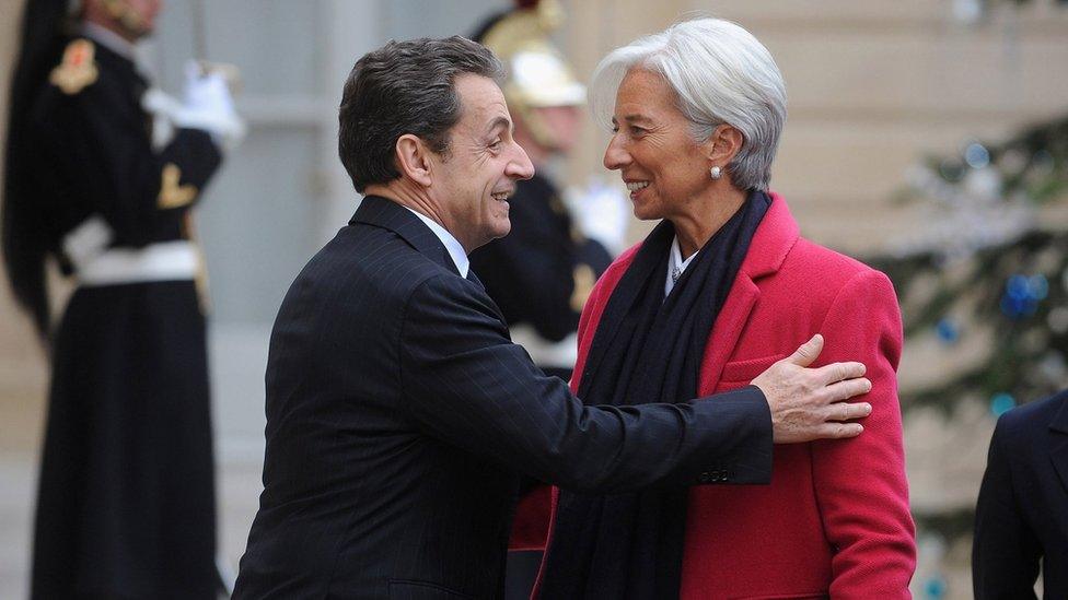 French President Nicolas Sarkozy (L) welcomes IMF chief Christine Lagarde at Elysee Palace on January 11, 2012 in Paris, France.