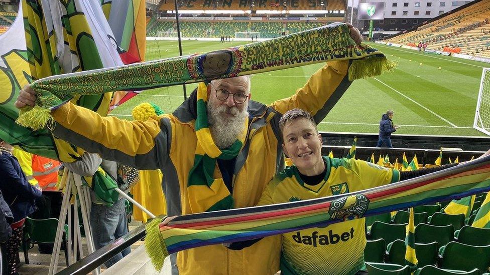 Supporter with a commemoration scarf