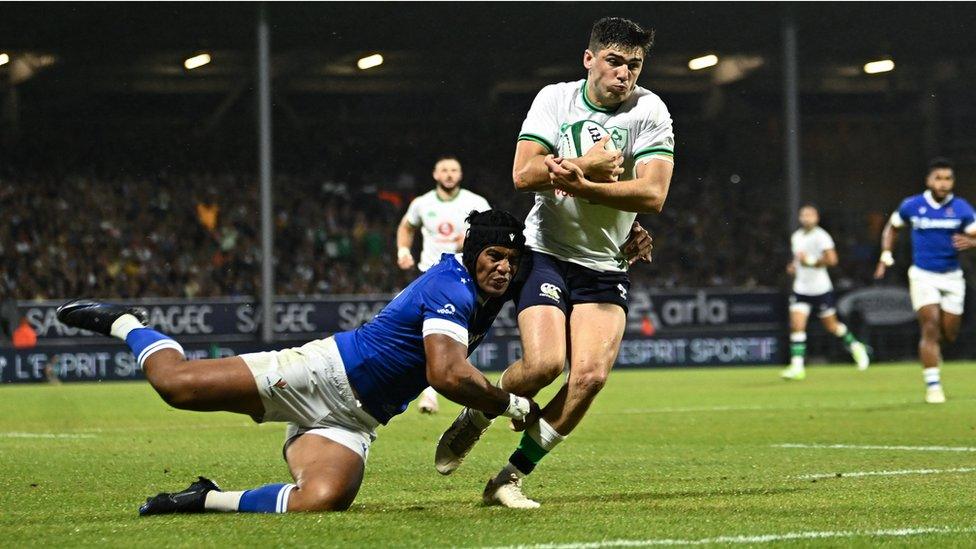 Jimmy O'Brien of Ireland on his way to scoring his side's first try despite the tackle of Ulupano Junior Seuteni of Samoa during the Rugby World Cup warm-up match between Ireland and Samoa at Parc des Sports Jean Dauger in Bayonne, France.