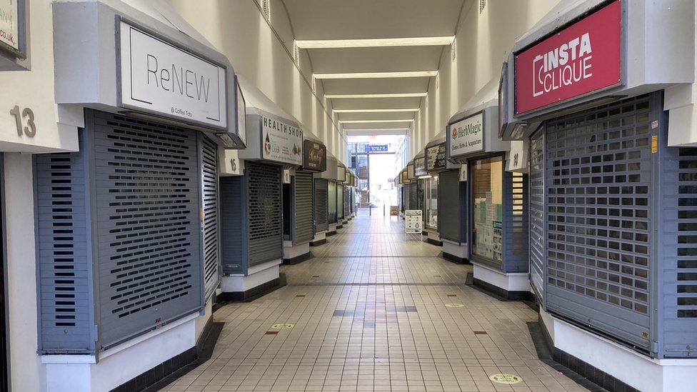 Shuttered shops in Coventry's City Arcade