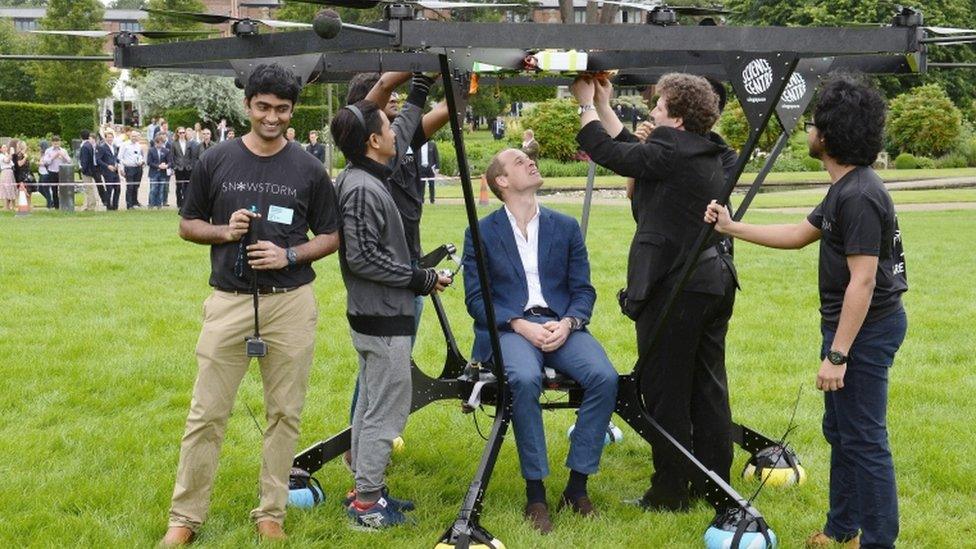 Prince William tries out a human-carrying drone with the founders forum.