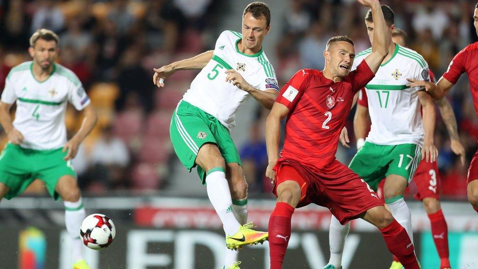 Northern Ireland's Jonny Evans attempts to tackle Czech Republic's Pavel Kaderabek