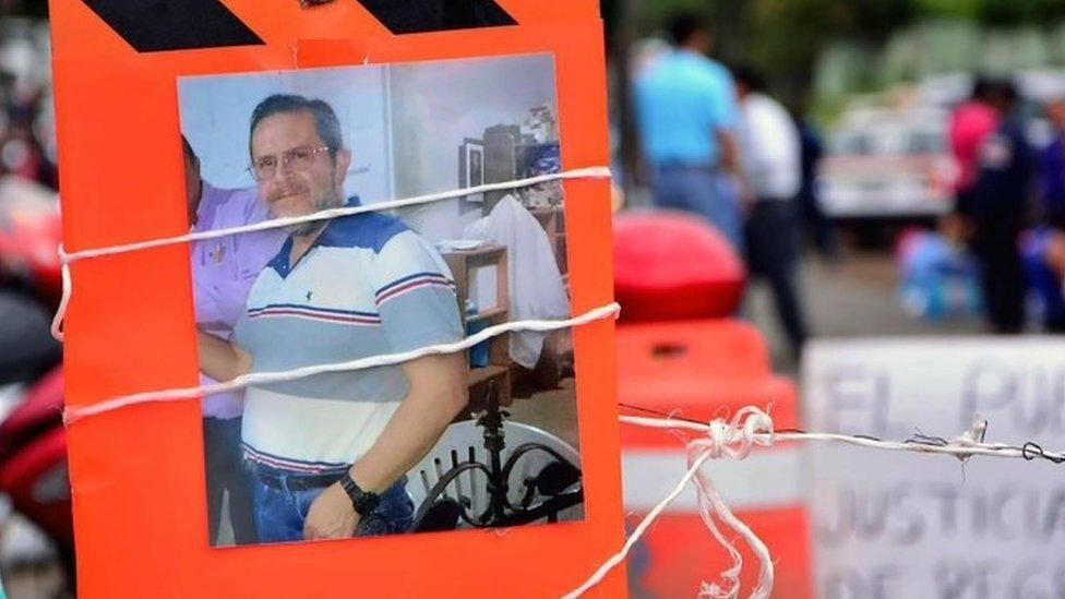 A sign with the portrait of Mexican priest Jose Luis Sanchez during a protest at Catemaco in Veracruz, Mexico on November 12, 2016